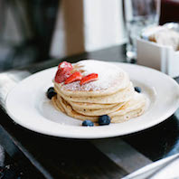 Whole Wheat Pancakes with fresh berries. Photo by Jared Lichtenberger