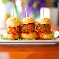 A trio of gravy meatball sliders